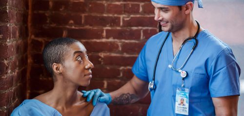 Cheerful doctor and female patient